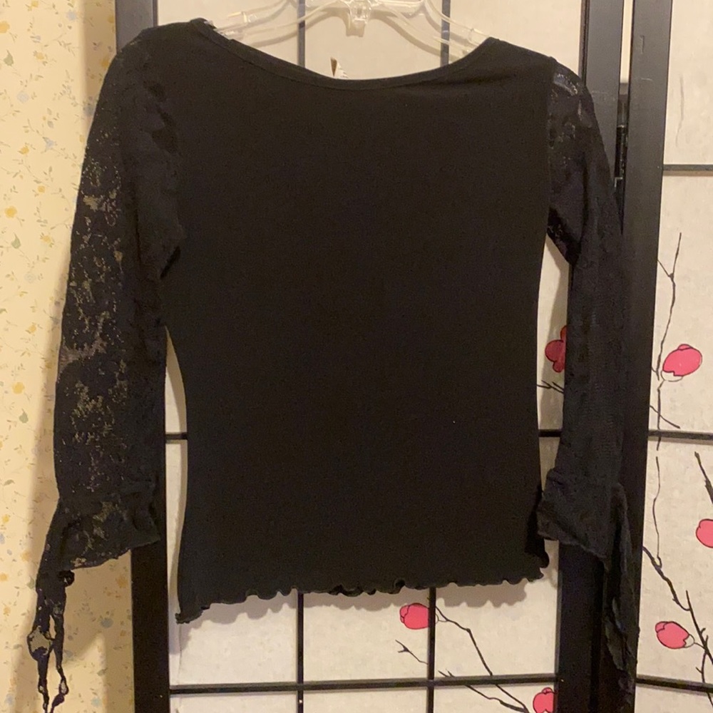 Gently used long sleeve Bebe top